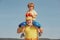 Grandfather and child fighting poses. Grandpa and little child boy in boxing stance doing exercises with boxing gloves.