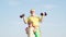 Grandfather and child lifting dumbbell. Healthy life and sport concept. Grandfather helping kid exercising with