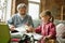 Grandfather and child playing together at home. Happiness, family, relathionship, education concept.