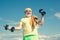 Grandfather exercising with dumbbell. Sport for senior man. Senior man lifting weights.