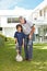 Grandfather and grandchild playing soccer