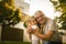 Grandfather and Granddaughter have fun outside.