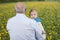 Grandfather with granddaughter , outdoors