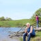 Grandfather and granddaughter travel to natural places