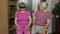 Grandfather and grandmother with VR headset helmet play games, watch virtual reality 3D 360 video