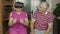 Grandfather and grandmother with VR headset helmet play games, watch virtual reality 3D 360 video