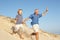 Grandfather And Grandson Enjoying Beach