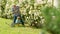 Grandfather with grandson gardening together. I love our moments in the countryside - remember time. Gardening hobby