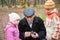 Grandfather with grandsons in wood