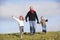 Grandfather Holding Hands With His Grandchildren