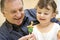 Grandfather playing with granddaughter