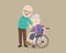 Grandfather soothes a grieving grandmother sitting on a wheelchair