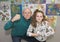 Grandfather in tough guys pose with granddaughter