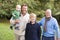 Grandfather walking with father and grandson