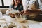 Grandma and Granddaughter Baking Kitchen at Home