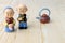 Grandma and grandpa dolls in chinese uniform style standing on wooden background. in chinese new year