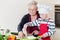 Grandma and grandson cooking together