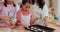 Grandma, mom and kids learning baking in a home kitchen counter together to prepare dessert as a skill or care. Family