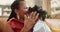 Grandmother, child and forehead kiss for love in home, affection and bonding or care in living room. Black family