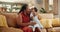 Grandmother, child and kiss or hug in home, affection and bonding or care in living room. Black family, love and grandma