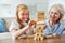 grandmother children granddaughter familiy childhood child senior creativity toy game wood brick toy block wooden