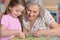 Grandmother collecting puzzle