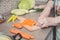 Grandmother cutting vegetables