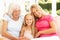 Grandmother, Daughter And Granddaughter Relaxing