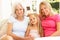 Grandmother, Daughter And Granddaughter Relaxing