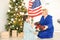 grandmother and granddaughter christmas with usa flag