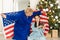 grandmother and granddaughter christmas with usa flag