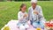 Grandmother and granddaughter at picnic in park