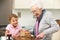 Grandmother and granddaughter preparing food