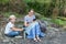 Grandmother and grandson relaxing in park