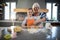 Grandmother helping granddaughter to flatten dough