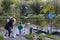 A grandmother and her excited grandson feed the ducks at Shaw`s Bridge on the River Lagan in South Belfast in Northern Ireland