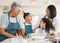 Grandmother, mom or happy kids baking in kitchen in a family home with siblings learning cooking skills. Cake, woman