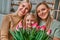 Grandmother, mother and daughter - family and generation. Family portrait with flowers. International Mother`s Day, Women`s Day