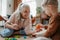 Grandmother playing with her little grandson, having fun together.