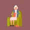 Grandmother Sitting In Armchair Kniting