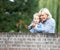 Grandmother smiling with baby girl outdoors