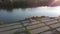 Grandmother teaches granddaughter how to ride a bike near a lake. top view. shooting on a kopter