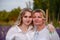 A grandmother and a teenage granddaughter pose in lupine fields