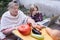 Grandmother telling to her grandson about the stages of cutting vegetables