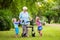 Grandmother with walker playing with two kids