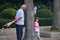 Grandpa and granddaughter are playing hide and seek