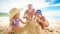 Grandpa Little Girl Boy Spread on Sand Heap on Beach by Surf