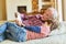 Grandpa reading a book with his grandson