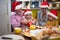 Grandparent enjoying with grandchildren in Xmas meal preparation. Christmas, family, together