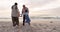 Grandparents, children and playing together at beach on fun vacation, holiday or sunset adventure. Senior man, woman and